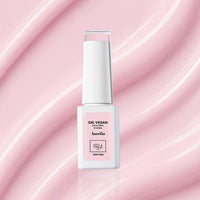 Flacon de vernis semi-permanent Gel Vegan 1944 Paris Aurélia 7 ml sur fond rose brillant.