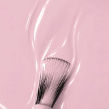 Texture crème rose pastel du vernis semi-permanent 1944 Paris Aurélia avec pinceau applicateur.