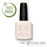 Flacon de vernis semi-permanent CND Shellac Naked Naiveté, teinte rose nude très clair et crémeux, format 7,3ml, formule sans TPO.