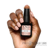 CND Shellac Uncovered porté sur les ongles avec son flacon 12,5 ml