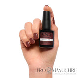 CND Shellac Wooded Bliss 12,5 ml porté sur les ongles avec flacon